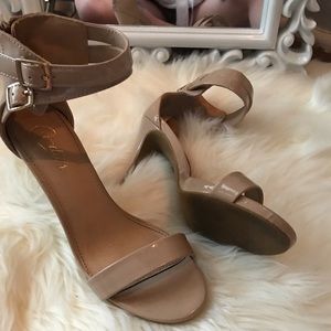 Nude buckle heels